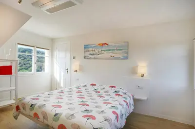 Cama o camas de una habitación en Homestay Villa Estrella - Costa Brava