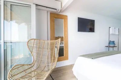 Cama o camas de una habitación en Sugar Beach Boutique Studio