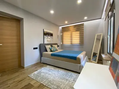 Cama o camas de una habitación en Tomas apartamentos Sagaro