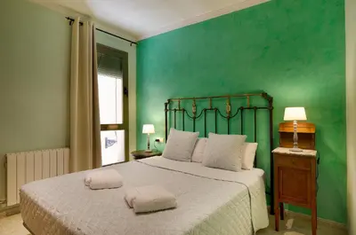 Cama o camas de una habitación en Rosa Street Apartment