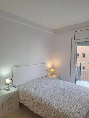 Cama o camas de una habitación en BRAVAHOLIDAYS-320-Condal