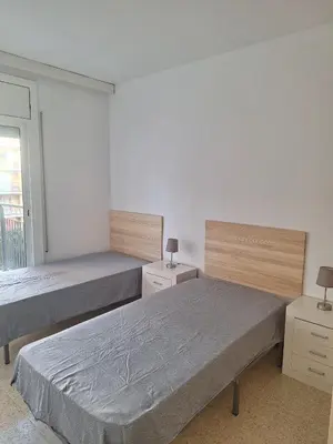 Cama o camas de una habitación en BRAVAHOLIDAYS-320-Condal
