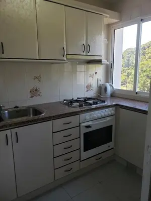 Una cocina o zona de cocina en Apart.3 habit.mar-mont. AC-Terraza-ascensor-parking