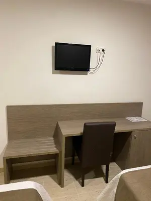 Una televisión o centro de entretenimiento en Ca La Maria
