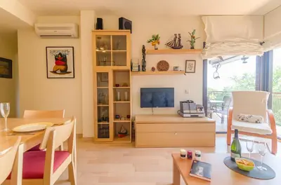 Una televisión o centro de entretenimiento en Boadella ATICO - SEAVIEW PENTHOUSE