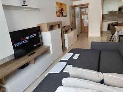 Una televisión o centro de entretenimiento en Piso Andrea