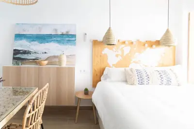 Cama o camas de una habitación en Coconut Beach Boutique Studio