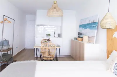 Cama o camas de una habitación en Coconut Beach Boutique Studio