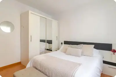 Cama o camas de una habitación en Hermoso apartamento cerca al mar