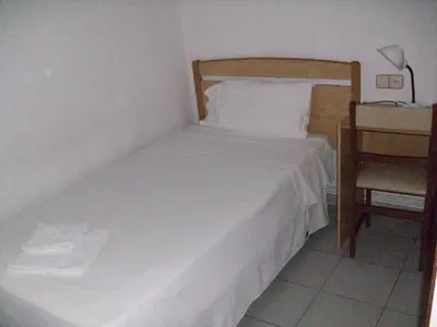 Cama o camas de una habitación en Pensió Viladomat