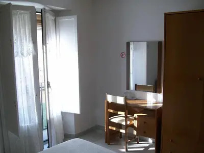 Cama o camas de una habitación en Pensió Viladomat