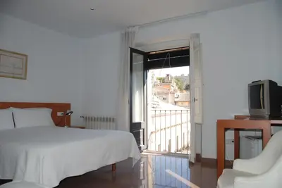 Cama o camas de una habitación en Pensió Viladomat