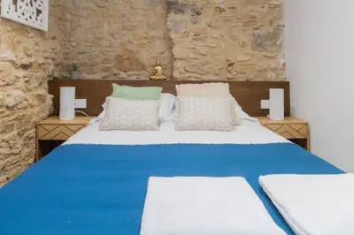 Cama o camas de una habitación en Terra Boutique Apartment