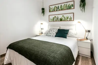 Cama o camas de una habitación en Tresor Boutique Apartment