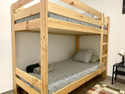 Cama o camas de una habitación en Apartamento el Cau, acogedor y cerca del Montseny