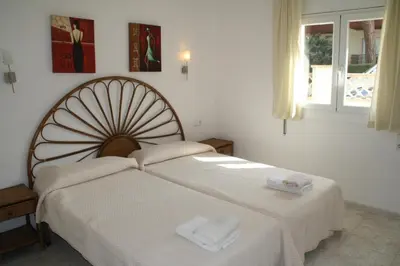 Cama o camas de una habitación en Apartaments Ocean Canada