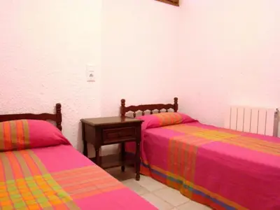 Cama o camas de una habitación en Marie Argonne CostaBravaSi