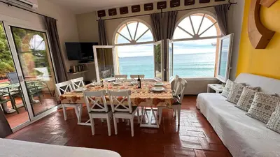 Zona de estar de Apartamento con jardín a 11 metros de la playa. SE.