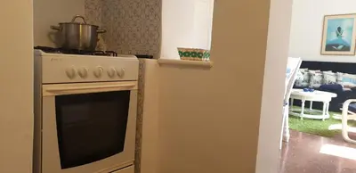Una cocina o zona de cocina en Casa con jardín a 30 metros de la playa. VC.