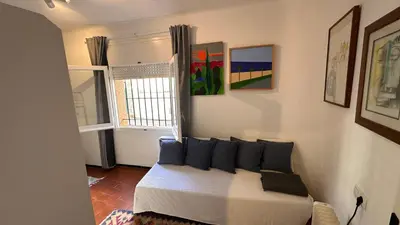 Zona de estar de Apartamento con jardín a 11 metros de la playa. B3.