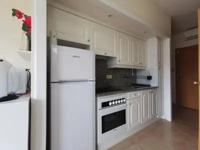 Una cocina o zona de cocina en VILLAS COSETTE - Apartamento Neptuno 414