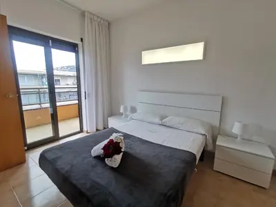 Cama o camas de una habitación en VILLAS COSETTE - Apartamento Neptuno 414