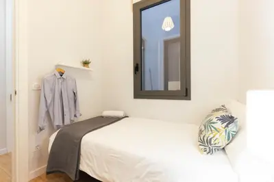 Cama o camas de una habitación en Bravissimo Riu Onyar, modern 3 bedroom apartment
