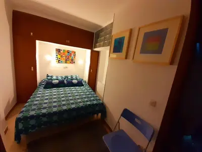 Cama o camas de una habitación en Apartamento vistas mar primera linea playa