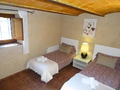 Cama o camas de una habitación en Masoveria de Cal Sastre