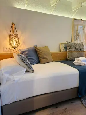 Cama o camas de una habitación en Hostal Sa Teula