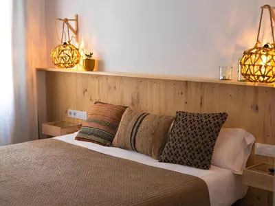 Cama o camas de una habitación en Hostal Sa Teula