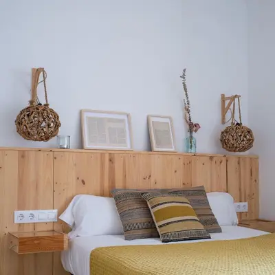 Cama o camas de una habitación en Hostal Sa Teula