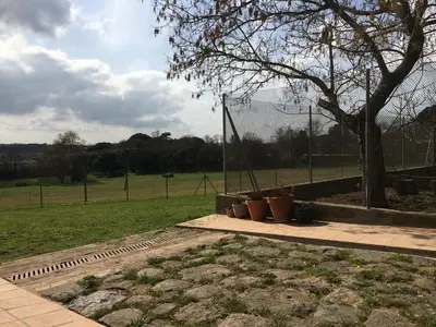 Jardín al aire libre en Mas Teixidor, Masia entre Girona y la Costa Brava