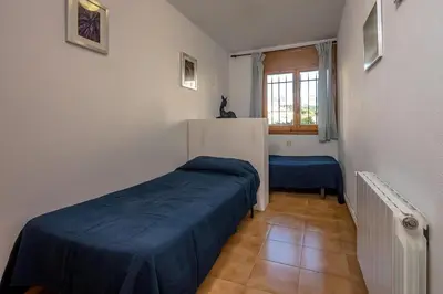 Cama o camas de una habitación en AA-1 CALELLA DE PALAFRUGELL 6PaX