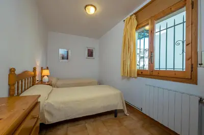 Cama o camas de una habitación en AA-1 CALELLA DE PALAFRUGELL 6PaX