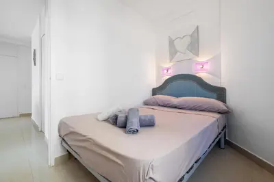Cama o camas de una habitación en Hauzify I Apartament Cannes