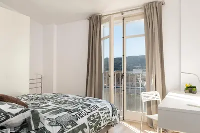 Cama o camas de una habitación en Hauzify I Apartament 4Winds