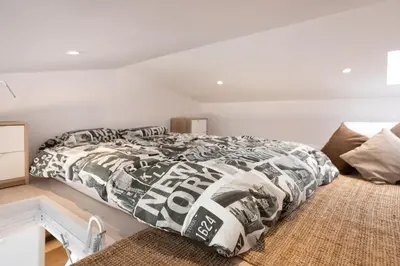 Cama o camas de una habitación en Hauzify I Apartament 4Winds