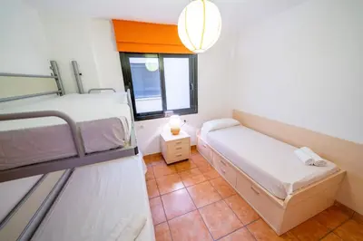 Cama o camas de una habitación en HomeHolidaysRentals Adara