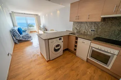 Una cocina o zona de cocina en HomeHolidaysRentals Marella - Costa Barcelona