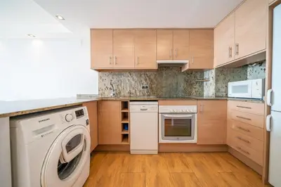 Una cocina o zona de cocina en HomeHolidaysRentals Marella - Costa Barcelona