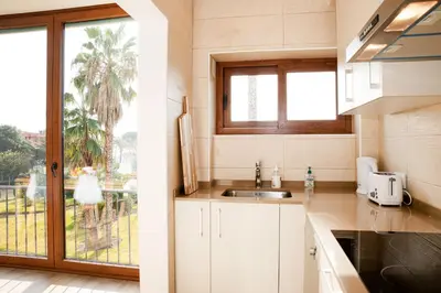 Una cocina o zona de cocina en Apartamento Palmeras en Platja d'Aro