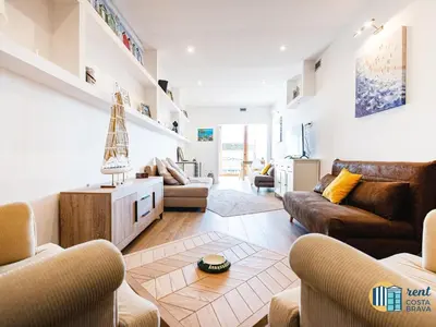 Zona de estar de Apartamento Palmeras en Platja d'Aro