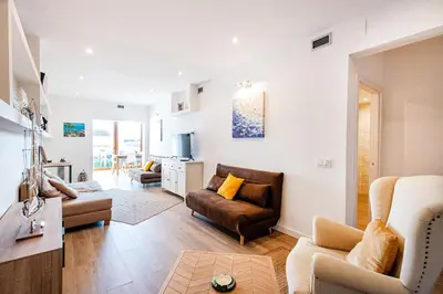 Zona de estar de Apartamento Palmeras en Platja d'Aro