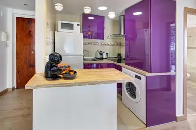 Una cocina o zona de cocina en APARTAMENT PAU CASALS, 2 min walk from the sea & sea view