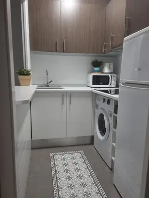 Una cocina o zona de cocina en SunSea Lloret Apartament