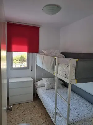 Cama o camas de una habitación en SunSea Lloret Apartament