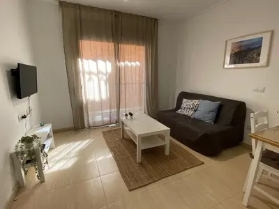 Una televisión o centro de entretenimiento en Apartments Brava