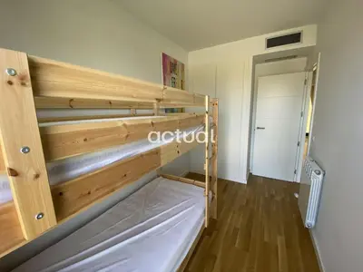 Cama o camas de una habitación en PARC DELS ESTANYS BLOC 1 BAIXOS C