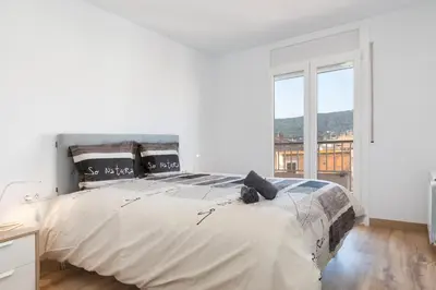 Cama o camas de una habitación en Hauzify I Apartament Big Family